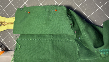 Pin the zipper guard