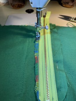 Sew the left zipper flap